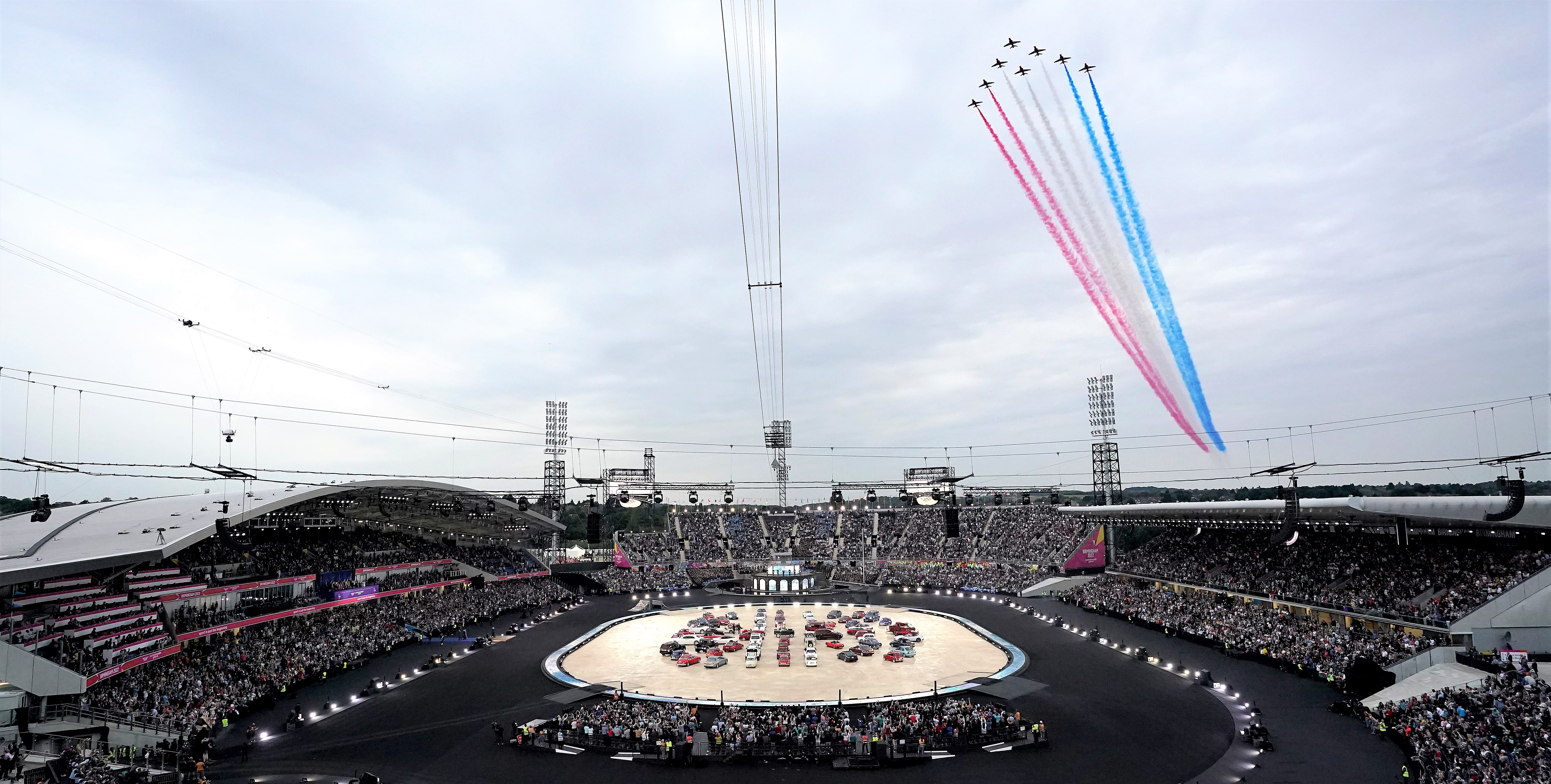 Red Arrows fly over Alexander Stadium at the Commonwealth Games Opening Ceremony
