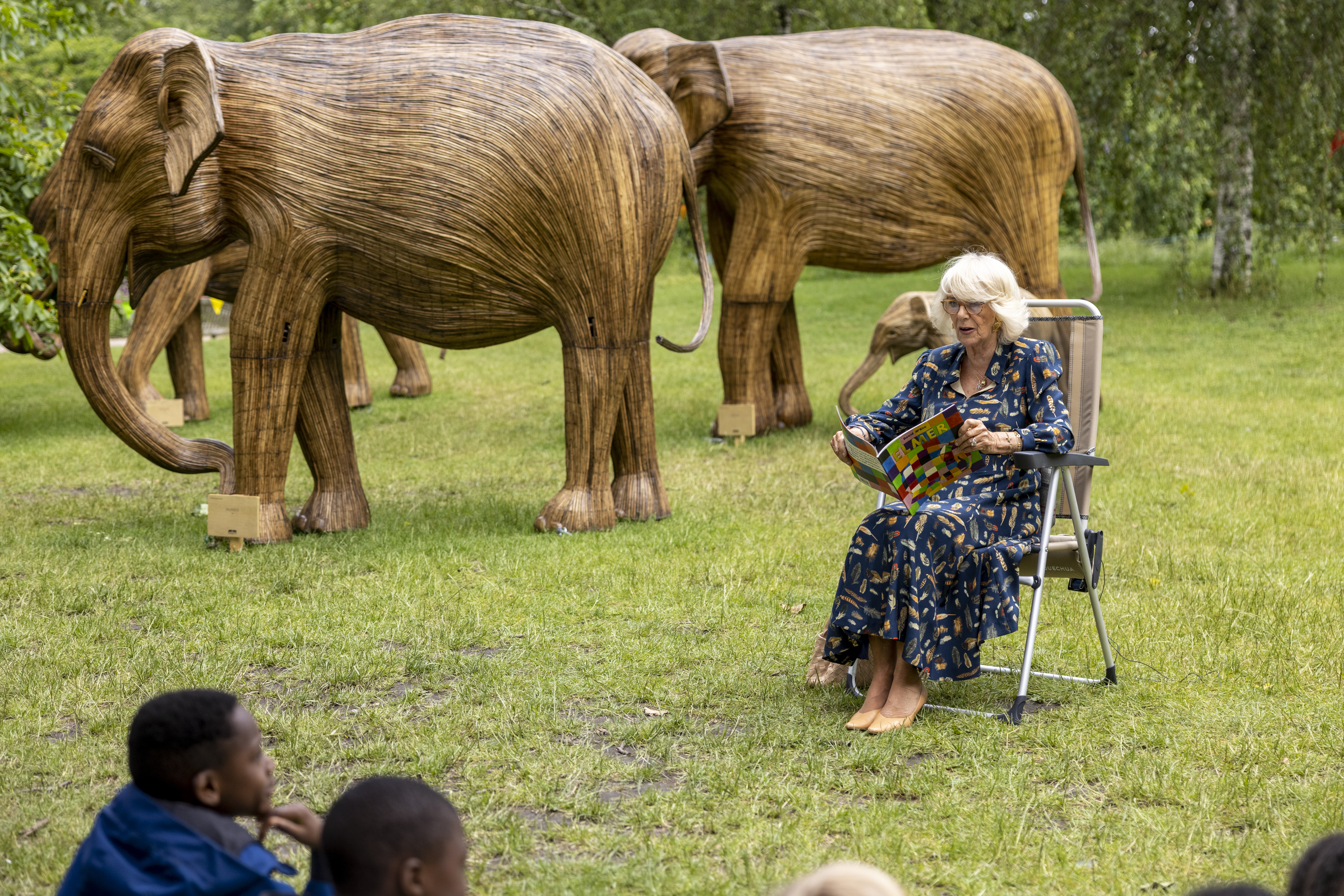 The Duchess of Cornwall, Patron of the National Literacy Trust and Joint President of Elephant Family, reads to school pupils