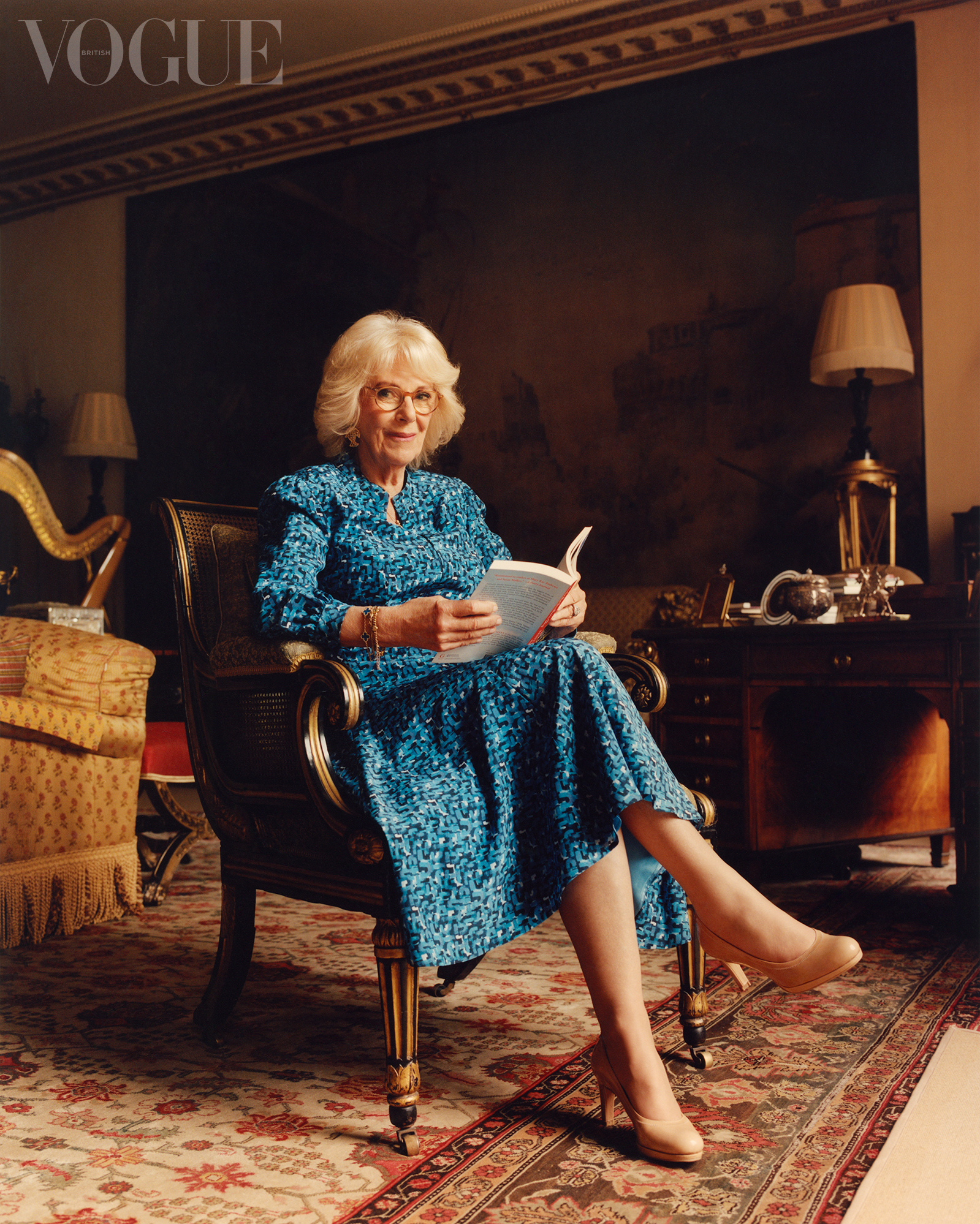 The Duchess of Cornwall, seen wearing a blue silk day dress by British designer Fiona Clare taken from her own wardrobe, photographed by Jamie Hawkesworth.