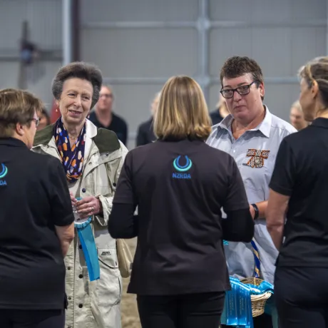 The Princess Royal meets volunteers in an indoor school