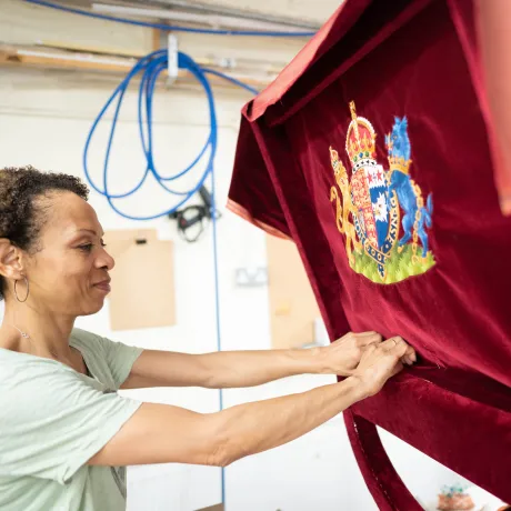 Restoration work on Their Majesties' Chairs of State taking place