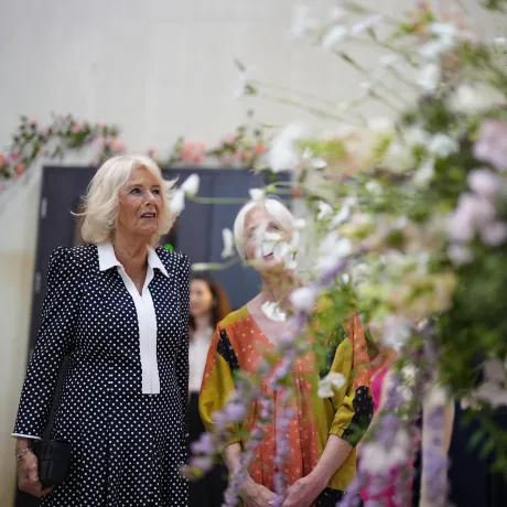 The Queen admiring a floral installation at the Garden Museum 