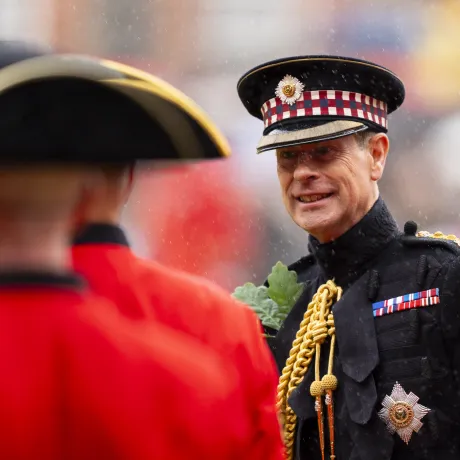 The Duke of Edinburgh speaks to Chelsea Pensioners during the Royal Hospital Chelsea's Founders Day ceremony