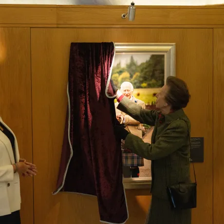 The Princess Royal unveils a portrait of The King at the Scottish Parliament