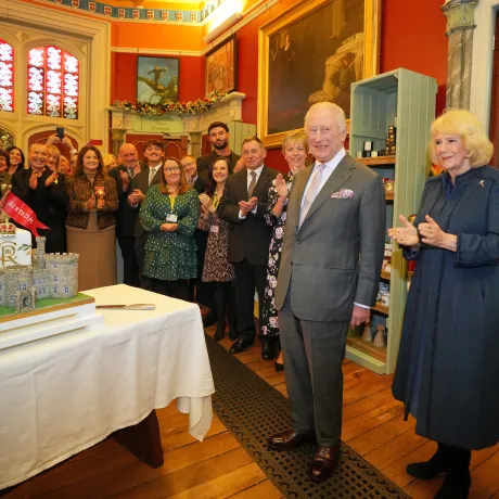 The King and Queen stood alongside His Majesty's birthday cake 