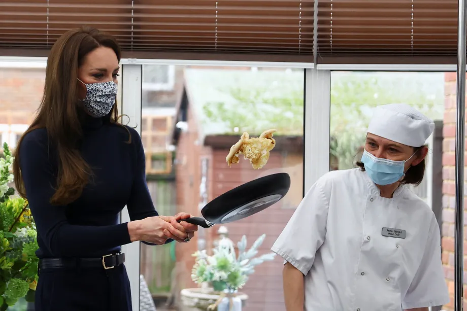 The Princess of Wales flips a pancake