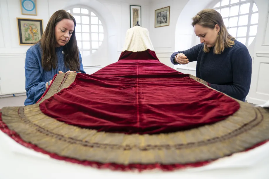 The Royal School of Needlework work on The King's Robe of State
