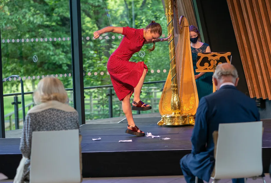 Their Majesties watch a performance by the Royal Welsh College of Music and Drama