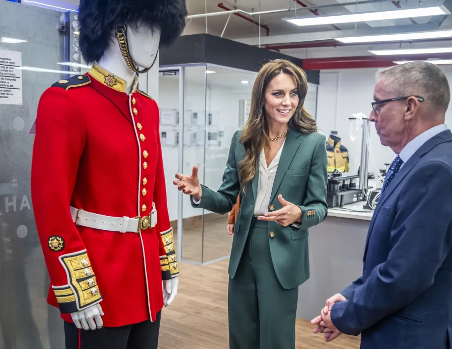 The Princess of Wales is shown a Guardsman's uniform produced at AW Hainsworth