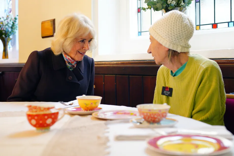 Queen Camilla meeting a resident of St John's Foundation almshouses at the Chapel of St Michael Within as she carry out engagements celebrating the 850th anniversary of St John's Foundation in Bath.