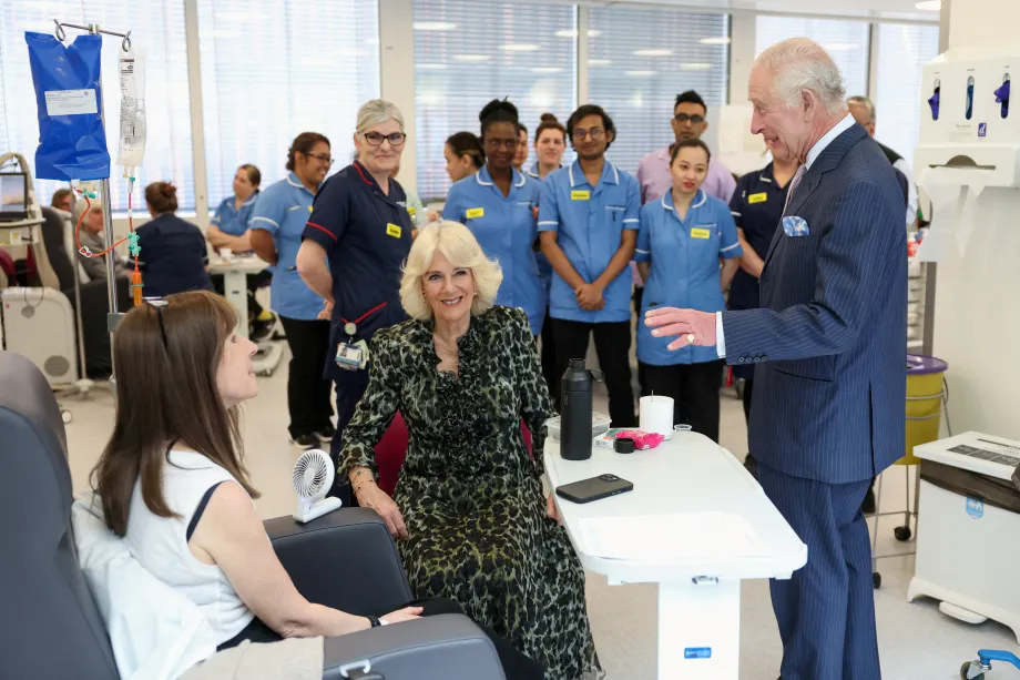 The King and Queen speak to a patient