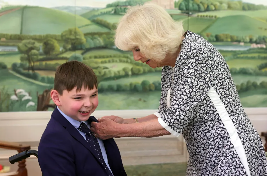 The Queen presents Tony Hudgell with his British Empire Medal [BEM]