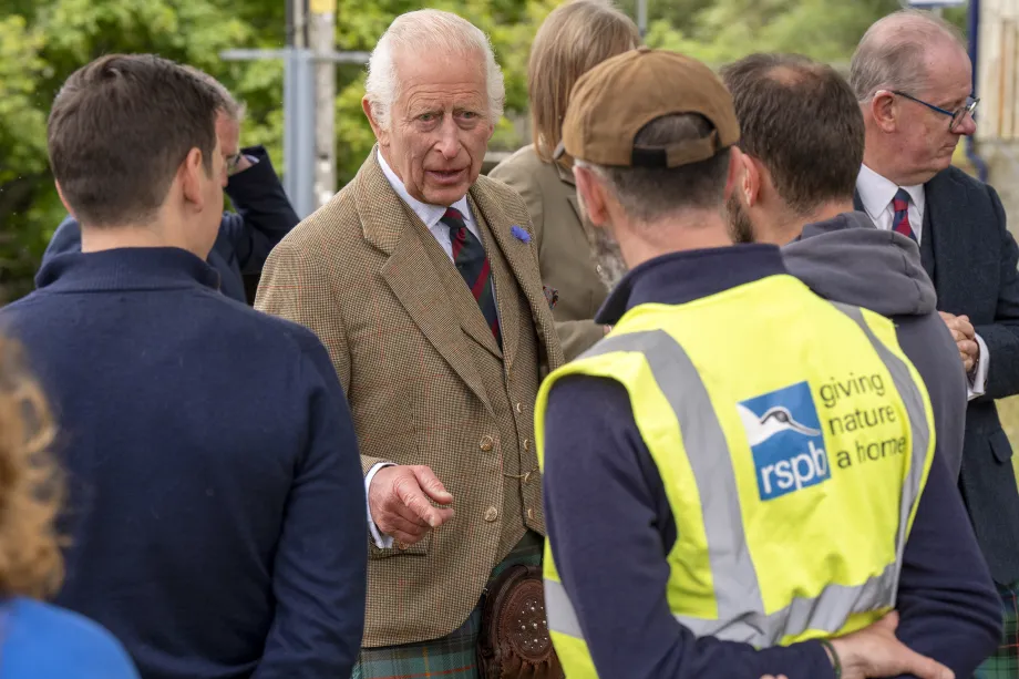 King Charles speaks to RSPB member of staff