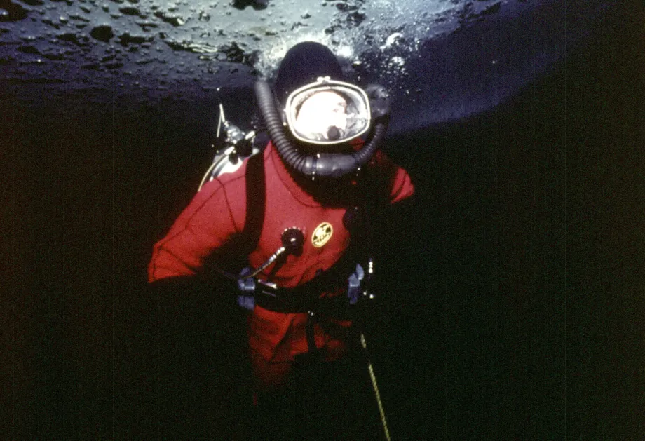 The King, when he was Prince of Wales, dives under arctic ice