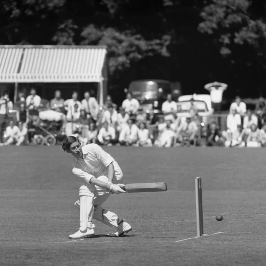 The King, when he was Prince Charles, sweeps a ball whilst playing in a Charity Cricket Match.