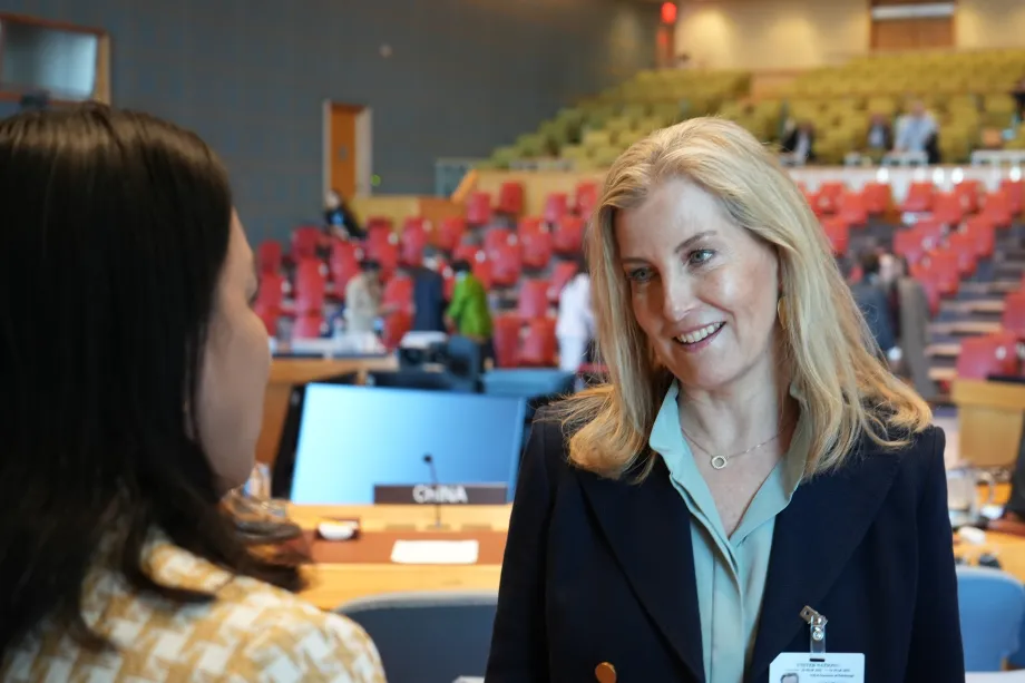 The Duchess in discussion with a guest at a conference