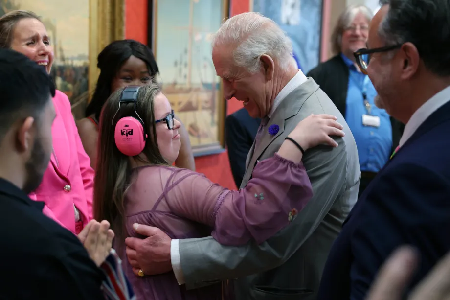 The King hugging