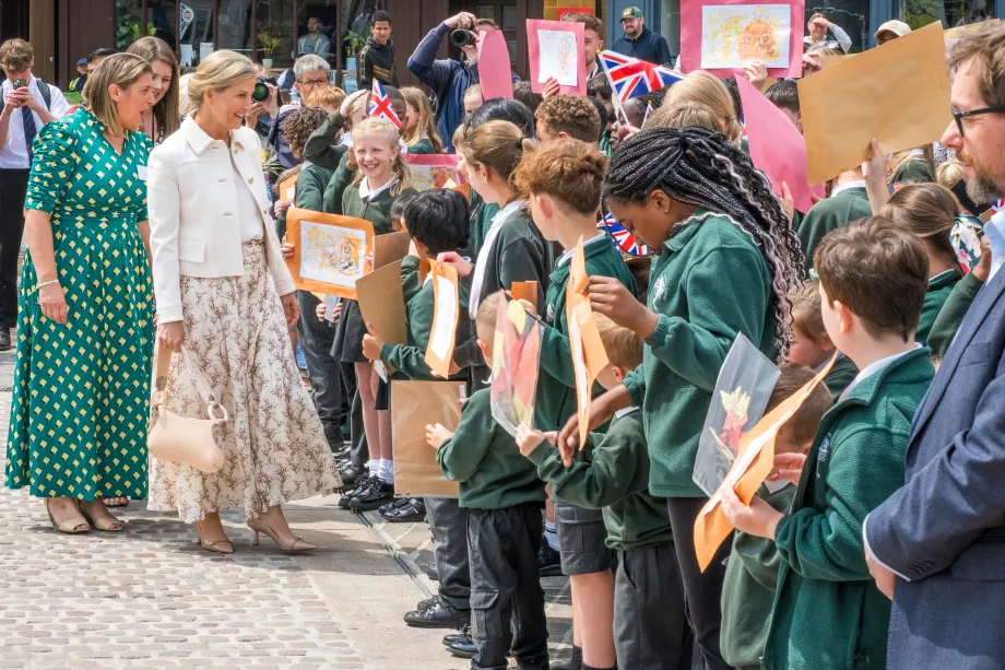 The Duchess of Edinburgh meets schoolchildren showcasing their artwork on a visit to Northhampton Town