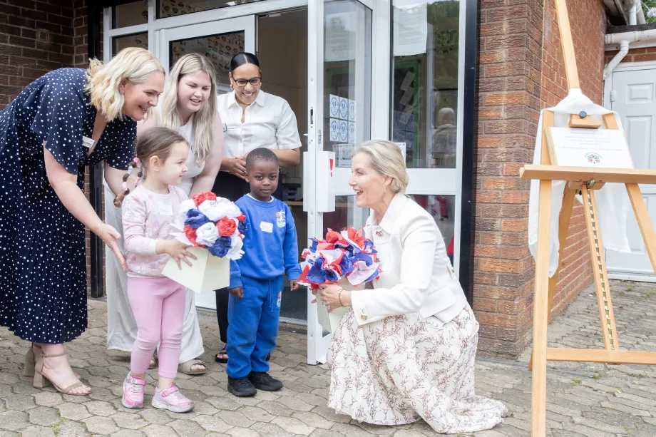 The Duchess of Edinburgh receives flowers from young children at Blackthorn Good Neighbours Nursery