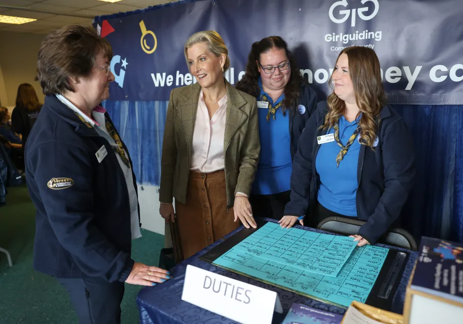 The Duchess of Edinburgh speaks with staff members of the Girl Guides at the Royal Cornwall Show