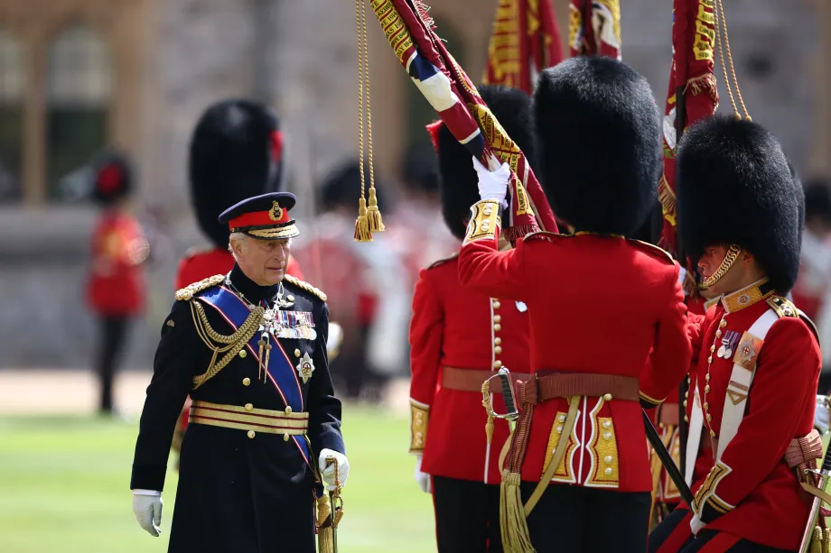 The King, Colonel-in-Chief of the Coldstream Guards, presents four new Colours to the 1st and 2nd Battalion (Number 7 Company) of the Coldstream Guards