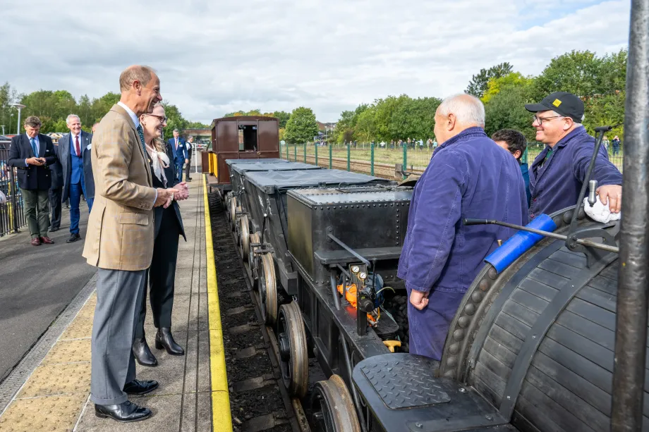 The Duke of Edinburgh chats to staff during the visit