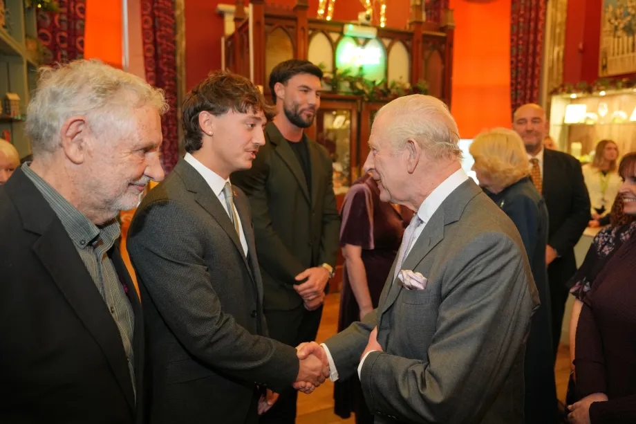 The King shakes hands with Lewis Leigh