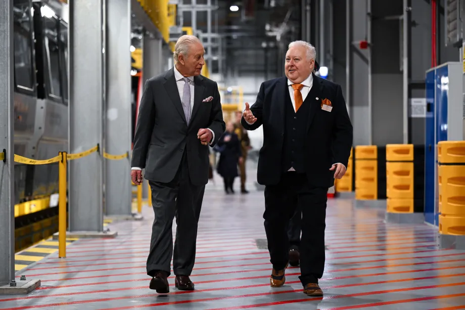 The King speaks with Chief of Staff, Rob Holmes