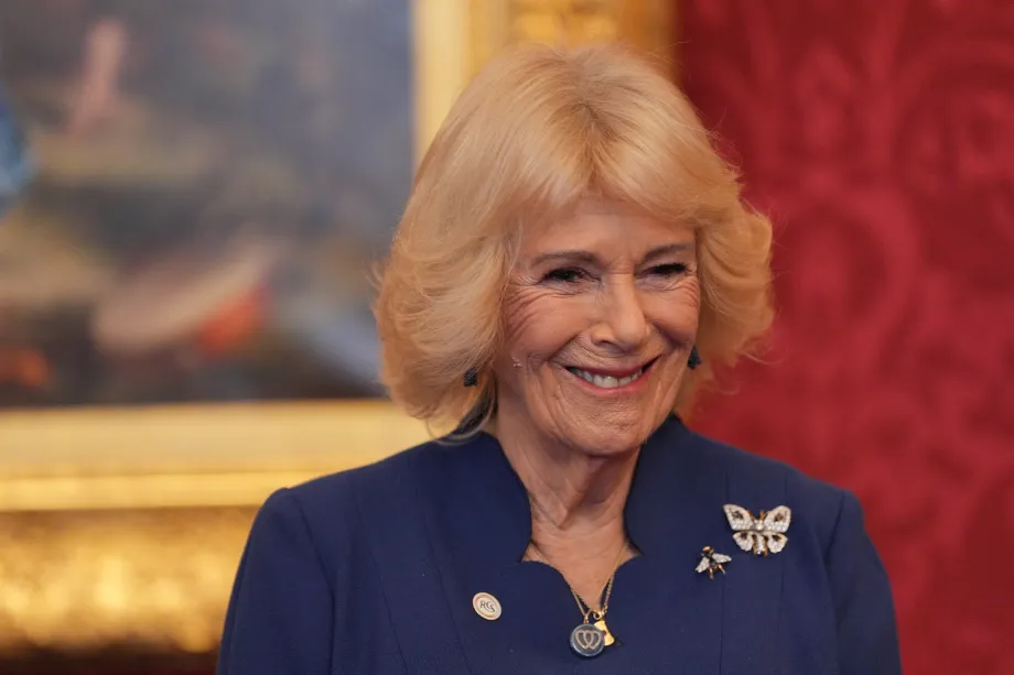 The Queen smiles during The Queen's Commonwealth Essay Competition