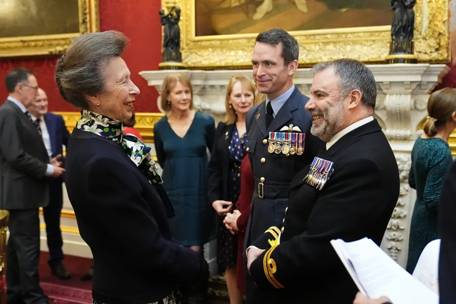 The Princess Royal meets guests during the Christmas tea party