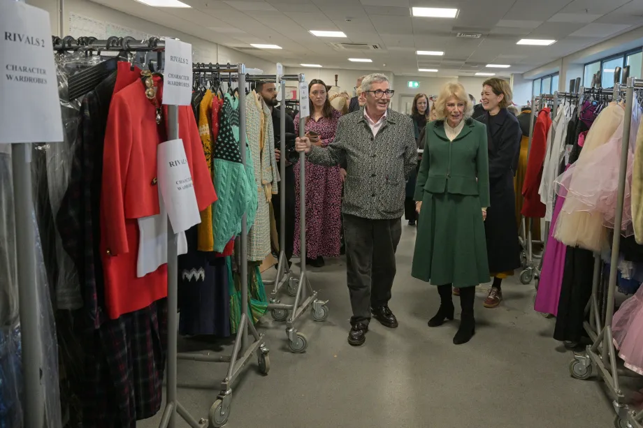 The Queen tours the costume department on the set of Rivals