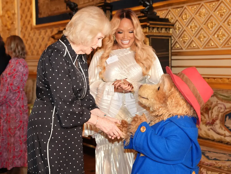 The Queen greets Paddington Bear and Marisha Wallace