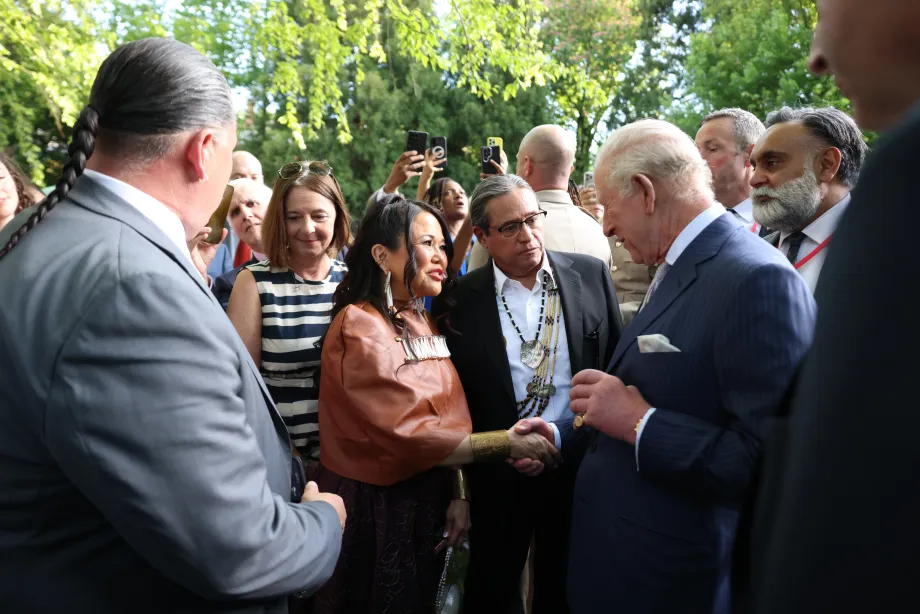 The King attends a garden party hosted at the British Ambassador's Residence