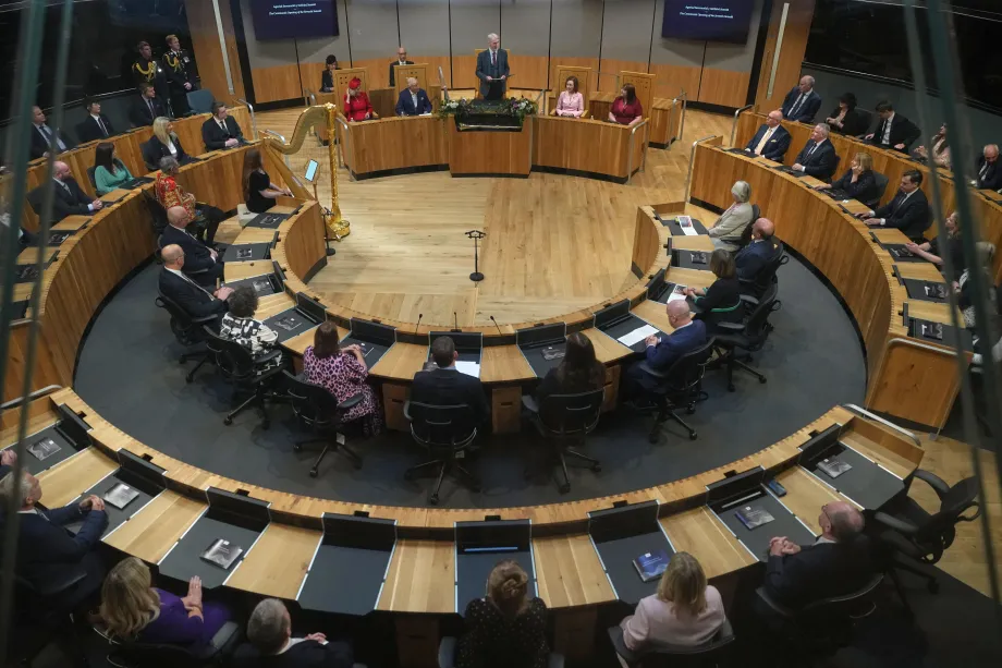 The King and Queen listen to Presiding Officer Huw Irranca Davies during the ceremonial opening