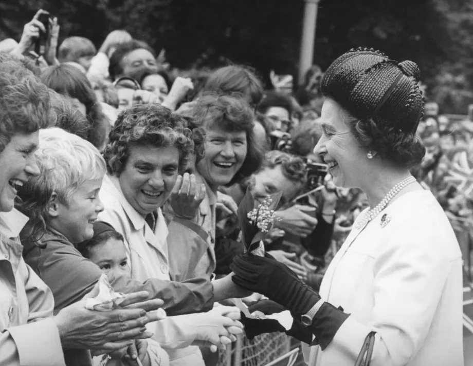 The Queen receives a lily of the valley posy