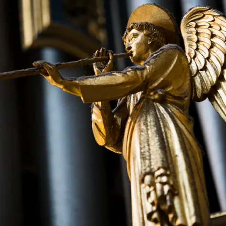 Golden angel with bugle