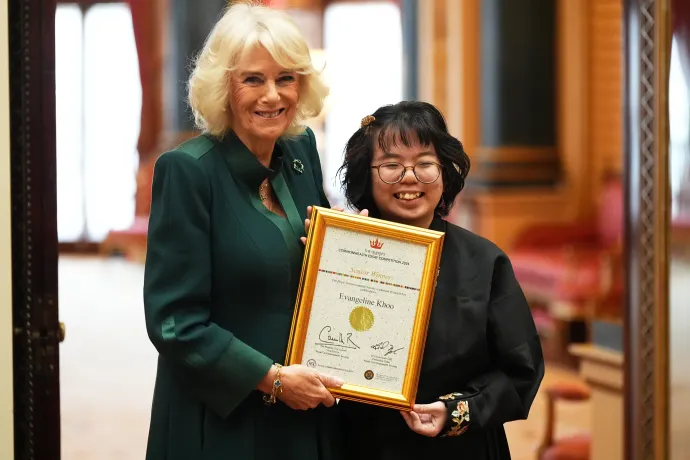 The Queen presents certificates to winners of the Commonwealth Essay Competition