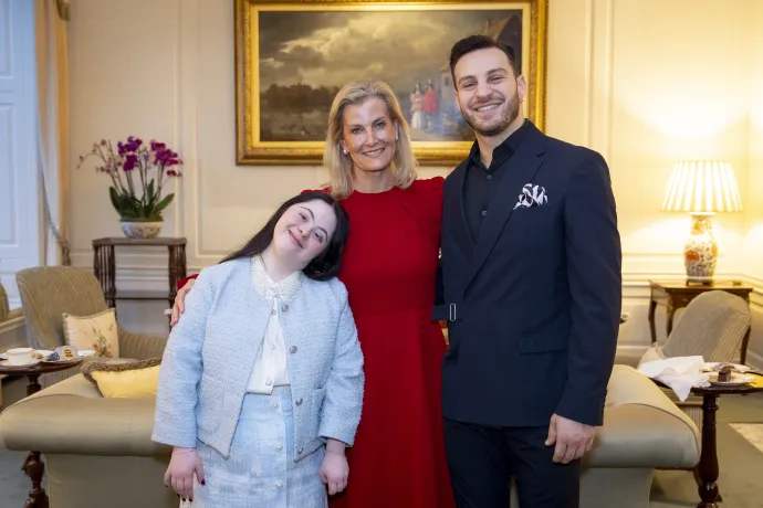 The Duchess of Edinburgh smiles alongside Ellie Goldstein and Vito Coppola