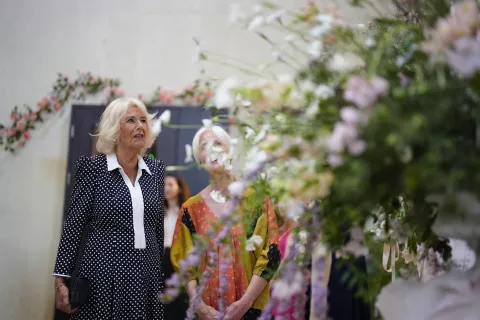 The Queen admiring a floral installation at the Garden Museum 