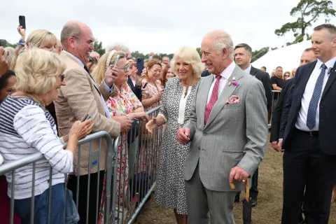The King and Queen meet members of the public during a visit to Sandringham Flower Show