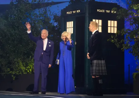 The King and Queen arrive at the Commonwealth Games's Opening Ceremony via tardis